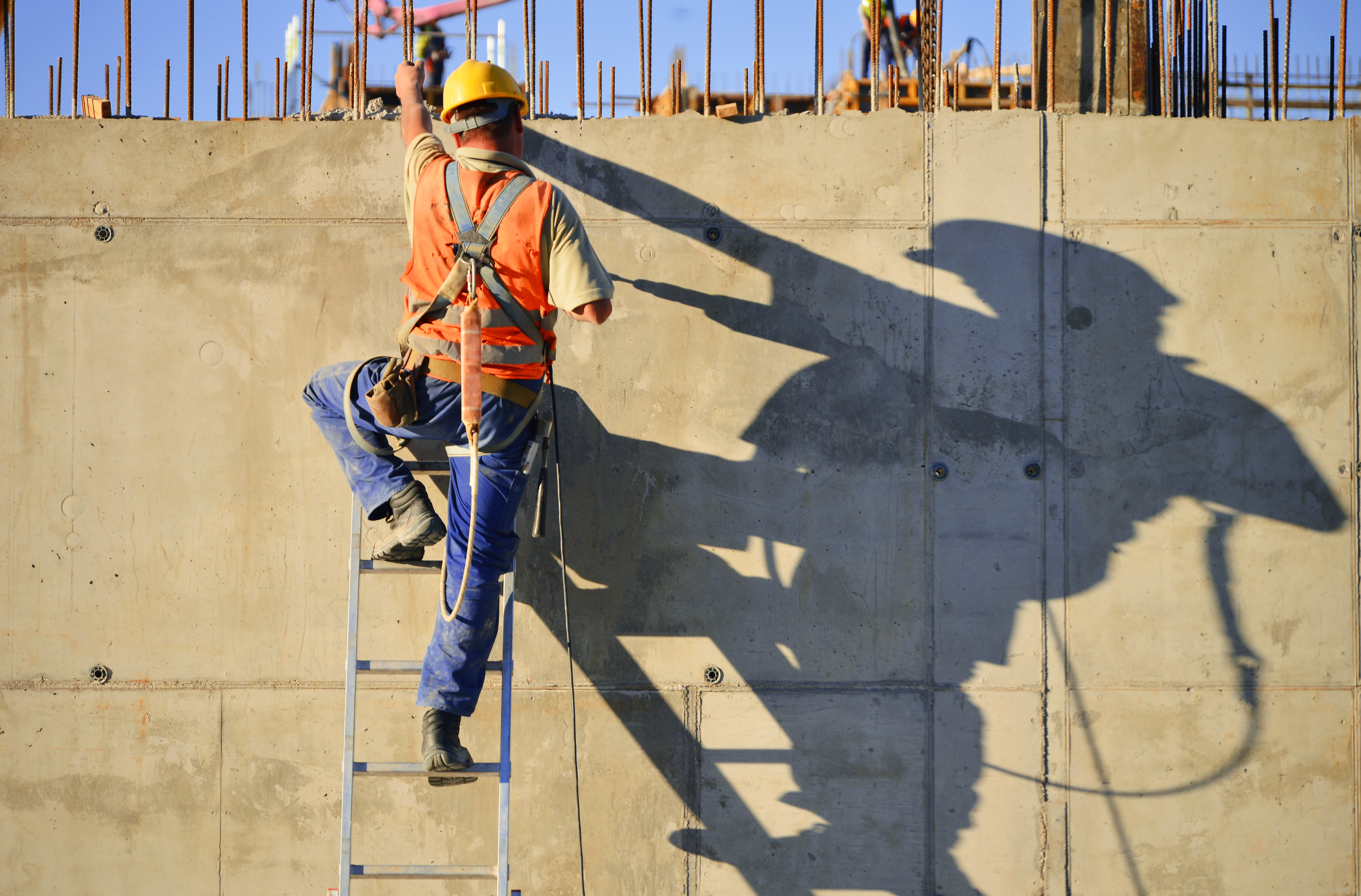 Construction worker on a ladder